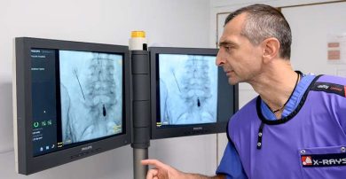 Technician checking x-rays