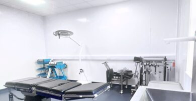 Overhead lit surgical bed in treatment room