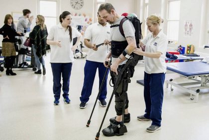 Exoskeleton therapy with staff support