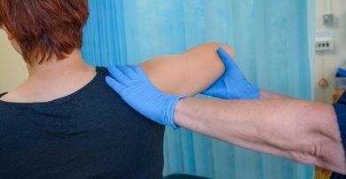 Physio working on patient's shoulder