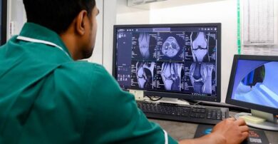 Technician checking medical images