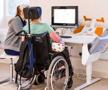 spinal rehab patient using tyromotion