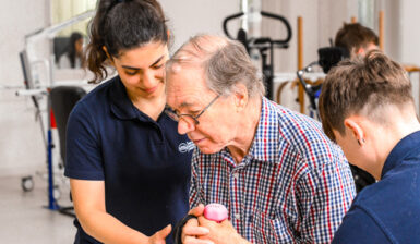 physiotherapists supporting stroke patient