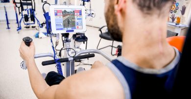 spinal rehab patient using FES bike