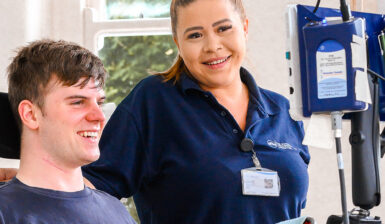 physiotherapist with spinal rehab patient